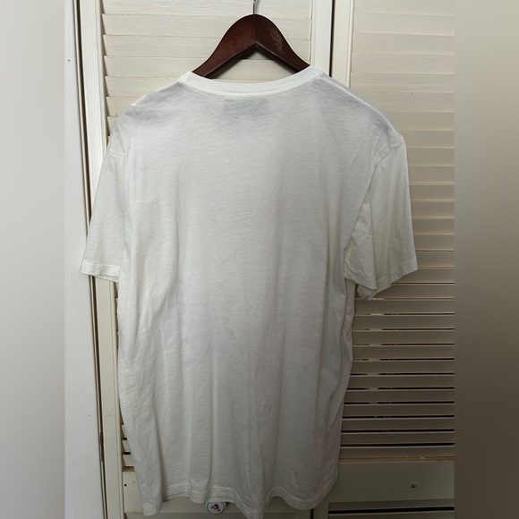 white t-shirt with red lettering. - Picture 2 of 3